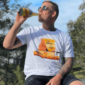 Man wearing white beer T shirt