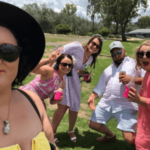 Group of friends with beer gauge stubby cooler